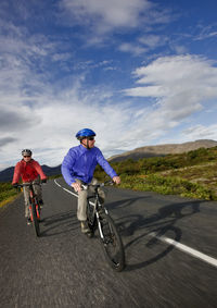 Two friends riding their mountain bikes around lake thingvellir