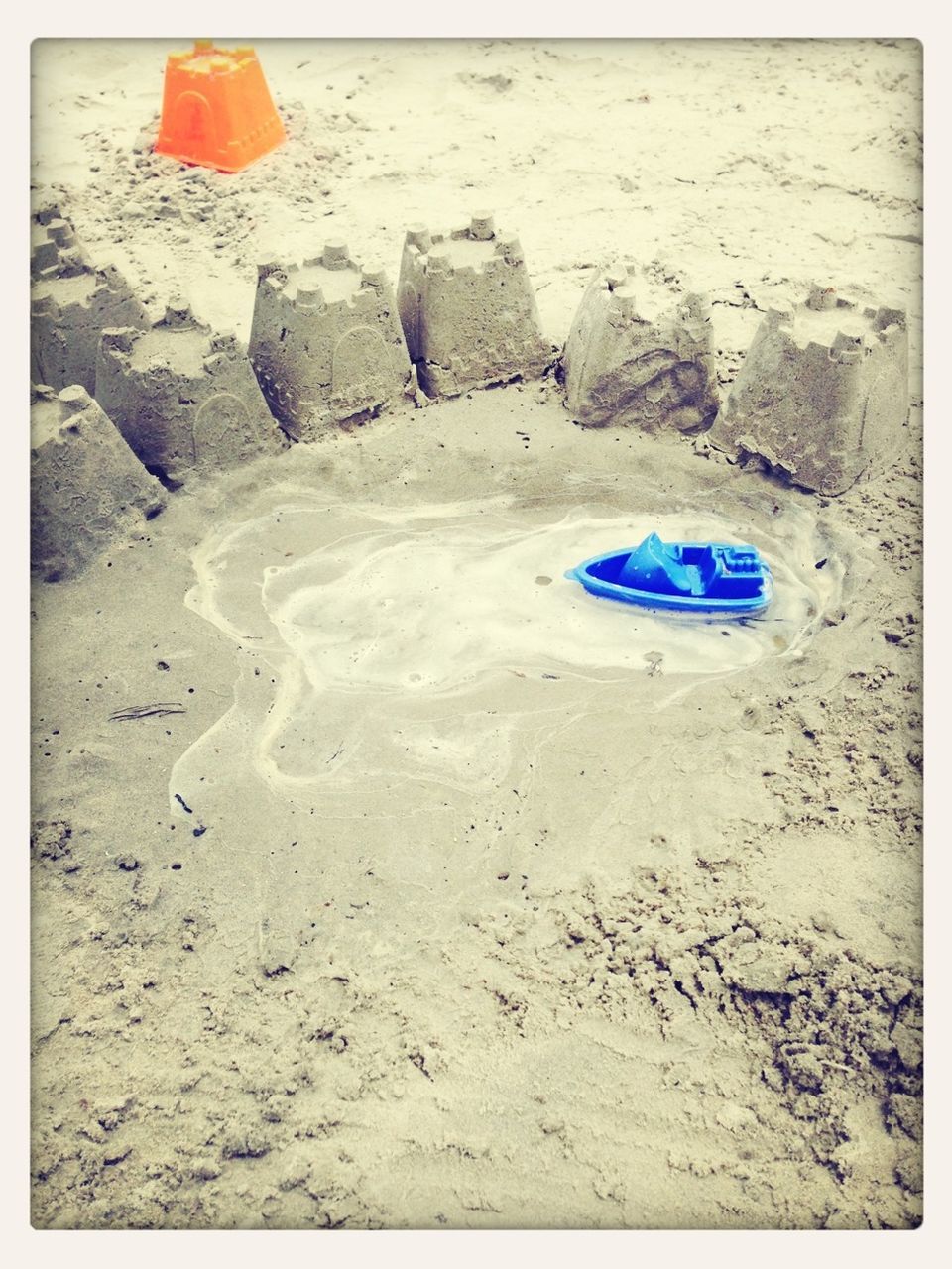 beach, sand, shore, transfer print, auto post production filter, tranquility, sea, day, footprint, absence, nature, outdoors, high angle view, abandoned, blue, sunlight, no people, vacations, sandy, tranquil scene