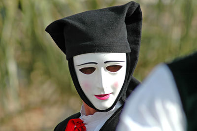 Mature woman wearing mask