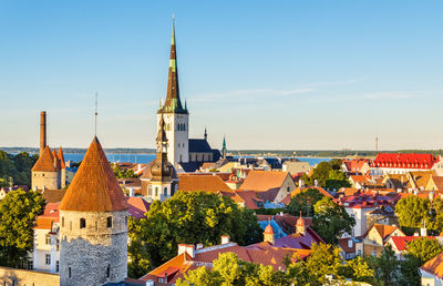 Panoramic view of buildings in city against sky