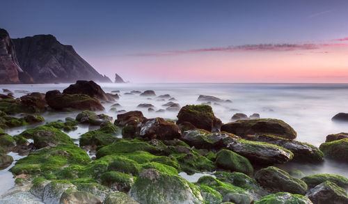 Scenic view of sea against sky during sunset