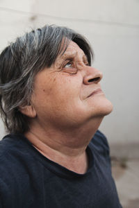 Close-up portrait of woman looking away