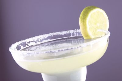 Close-up of lemon slice against black background