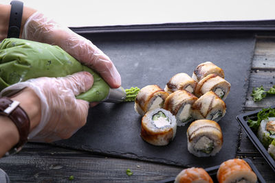 Close-up of person preparing food