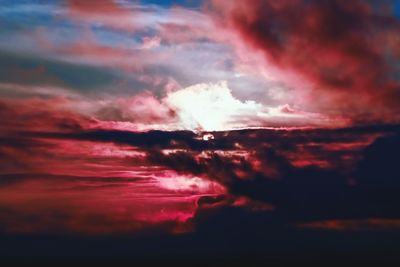 Low angle view of dramatic sky during sunset