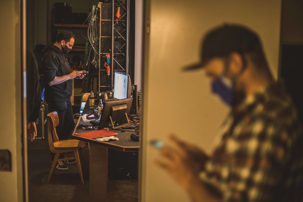 PEOPLE WORKING IN KITCHEN