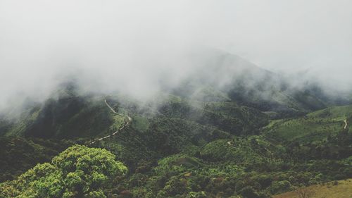 Scenic view of mountains during foggy weather