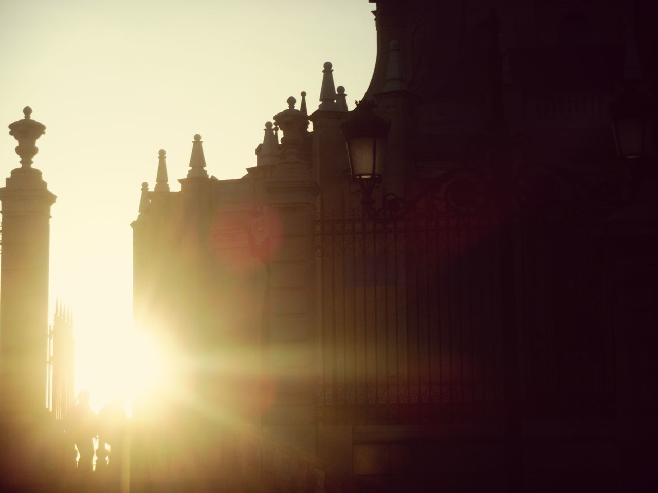 STATUE OF CITY AT SUNSET