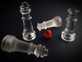 Close-up of chess pieces on table