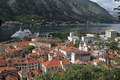 High angle view of townscape by lake