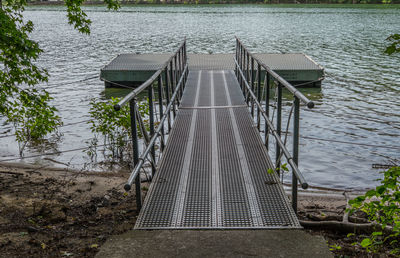 Empty floating dock used for small paddle boats canoes and kayaks to launch into the lake 