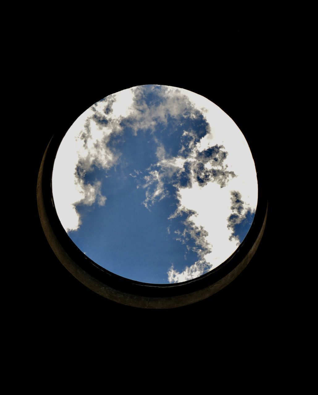 LOW ANGLE VIEW OF SKY SEEN THROUGH SILHOUETTE OF ARCH