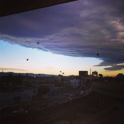 View of city at sunset