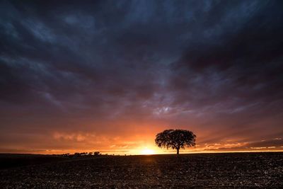 Scenic view of dramatic sky during sunset