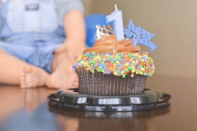 Close-up of birthday cake on table