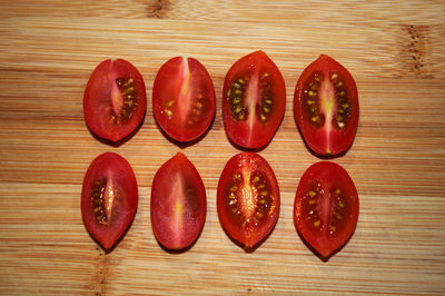 Directly above shot of red fruits on table