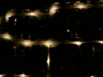 High angle view of illuminated cityscape at night