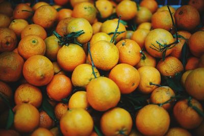 Full frame shot of oranges at market stall