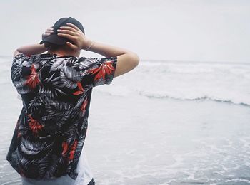 Man photographing sea