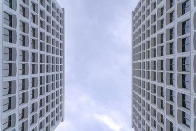 Low angle view of modern buildings against sky