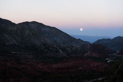 Scenic view of mountains against sky during sunset