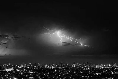 Illuminated cityscape at night