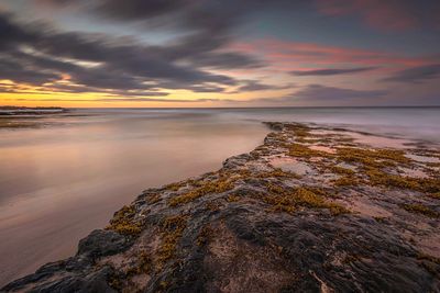 Idyllic shot of sea against sky during sunset