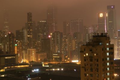 Illuminated cityscape at night