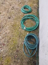 High angle view of various container on field