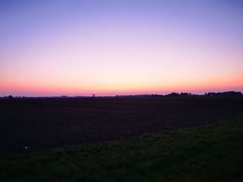 Scenic view of silhouette landscape against sky during sunset