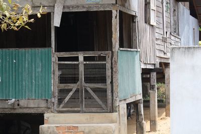 Broken window of old building