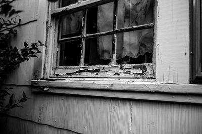 Close-up of damaged window