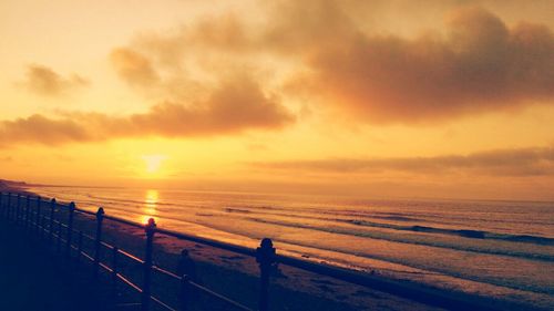 Scenic view of sea at sunset