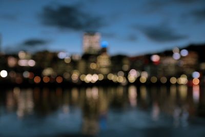 Defocused image of illuminated buildings at night