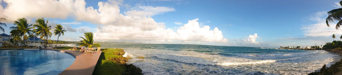 Panoramic view of swimming pool against sky