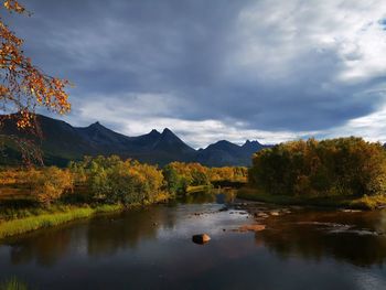 Scenic view of lake against sky during autumn