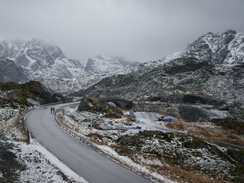 Scenic view of snowcapped mountains against sky - roadview