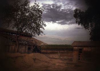 Built structure against cloudy sky