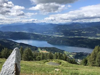 Scenic view of landscape and mountains against sky