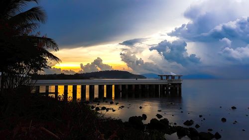 Scenic view of sea against sky at sunset