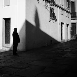 Full length of woman standing in building