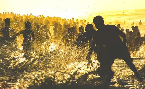 Reflection of people in water