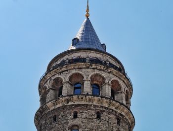 Low angle view of tower against clear blue sky