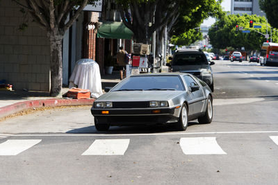 Cars on road in city