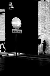 Road sign on street in city