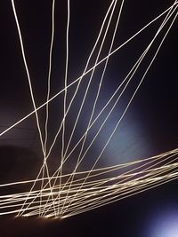 Low angle view of vapor trails in sky