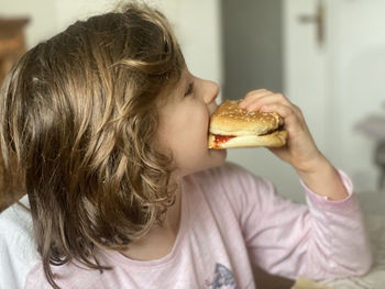 Portrait of a girl eating ice cream