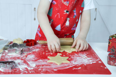 Midsection of woman preparing food