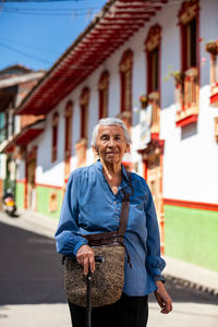 Senior woman tourist at the heritage town of salamina in the department of caldas in colombia