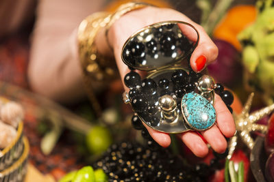 Close-up of hand holding ice cream